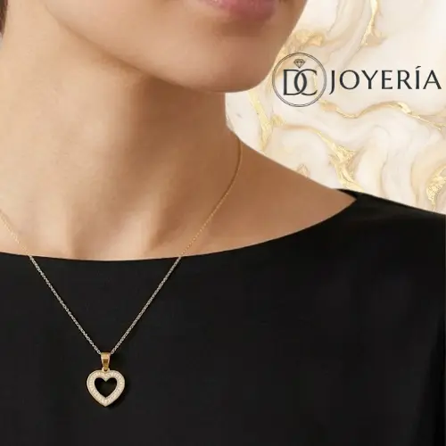 Dije corazón hueco dorado con zircones — Acero inoxidable Dorado